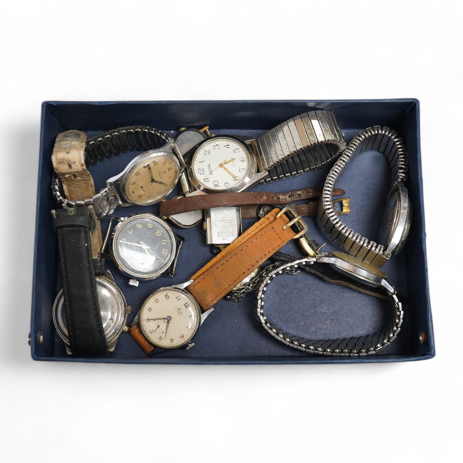 A group of eleven assorted lady's and gentleman's wrist watches including a steel Timex automatic, two steel Avia manual wind wrist watches and a steel Cyma Triplex Cymaflex manual wind wrist watch. Condition - poor to f